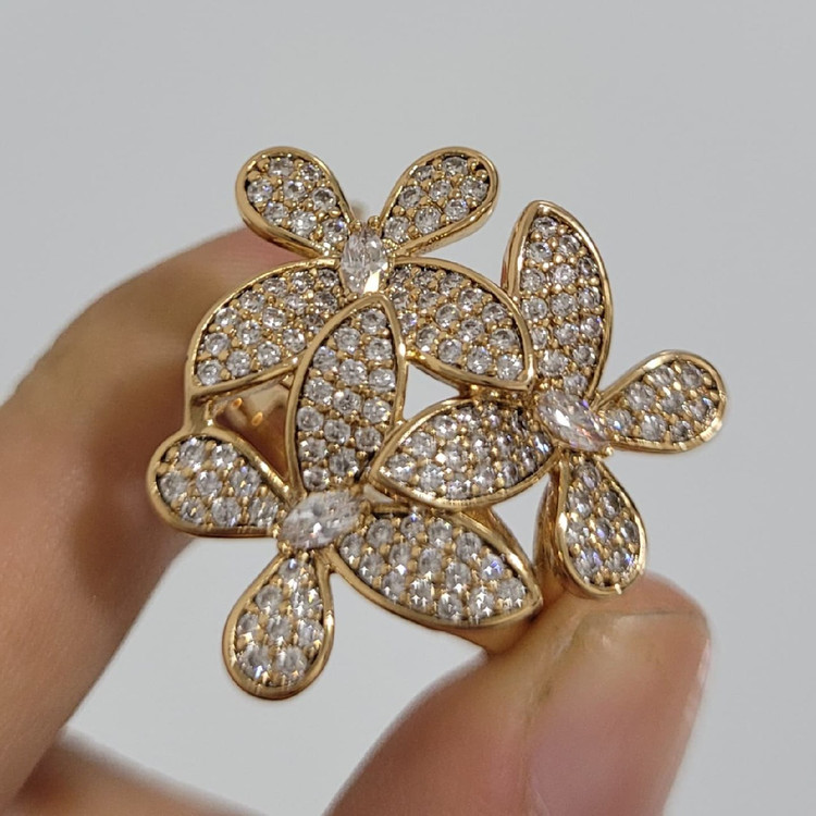 انگشتر زنانه طرح طلا ژوپینگ مدل گل با نگین های ریز