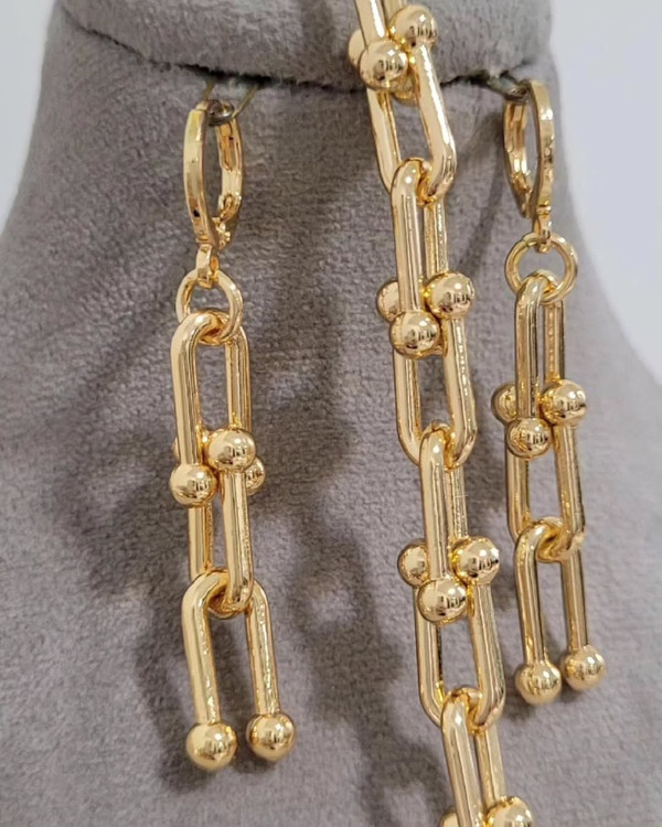 سرویس زنانه طرح طلا شین مدل تیفانی با زنجیر کارتیه گویدار طلایی