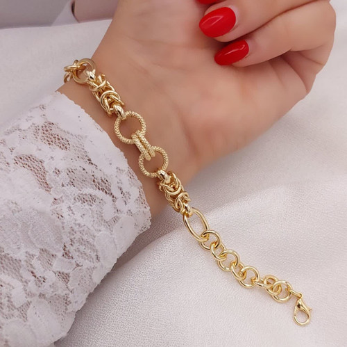 دستبند حلقهای زنانه طرح طلا برند شین با طراحی زنجیری و بافتهای ظریف