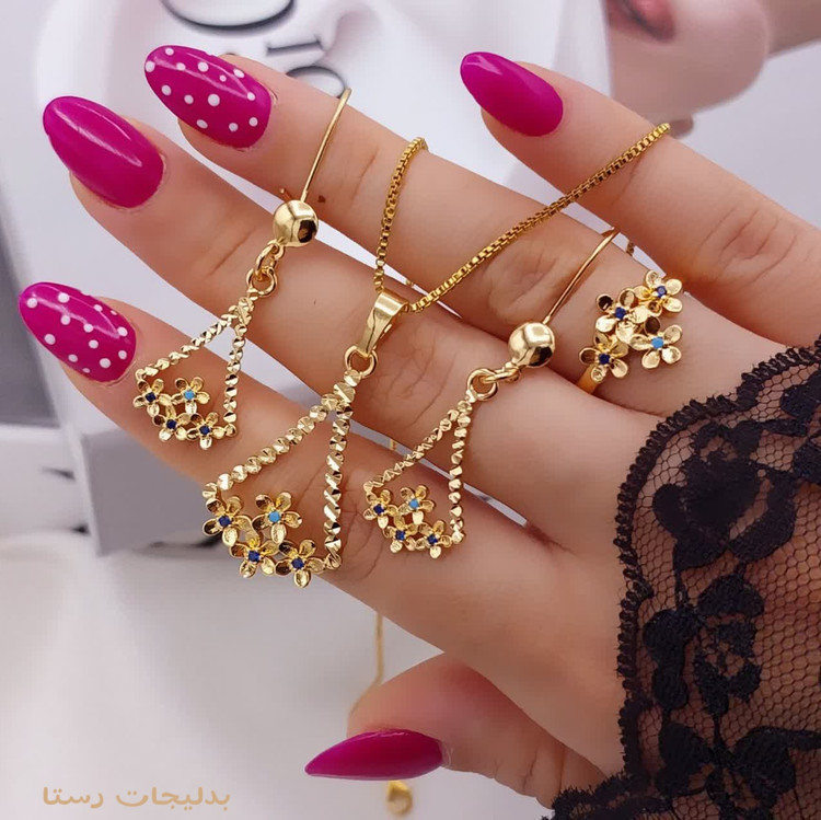 نیمست انگشتردار زنانه برند H_M با طراحی گلدستهفلزی