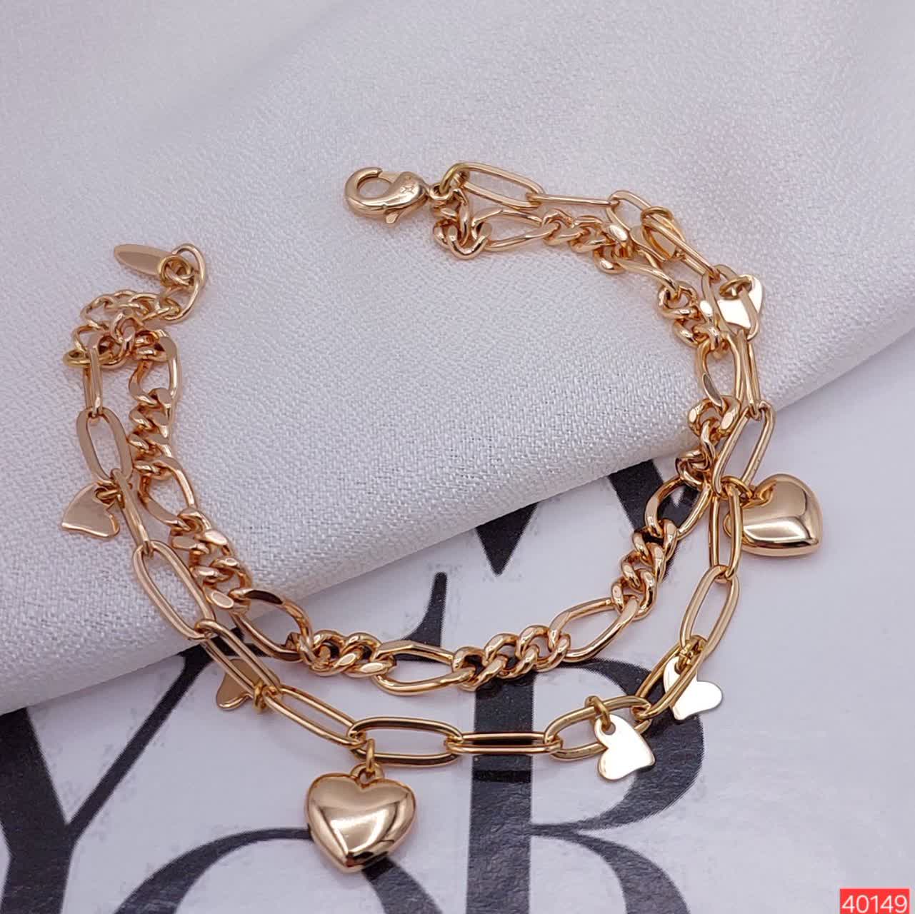 1. دستبند ژوپینگ اصل زنانه مدل دولایه قلب با آبکاری طلای لوکس کد 40149 2. خرید دستبند مارک ژوپینگ رنگ ثابت طرح دو قلب مدل 40149 از بدلیجات رستا 3. دستبند ظریف دخترانه ژوپینگ مدل قلب دولایه ضد حساسیت با درخشش خیره‌کننده