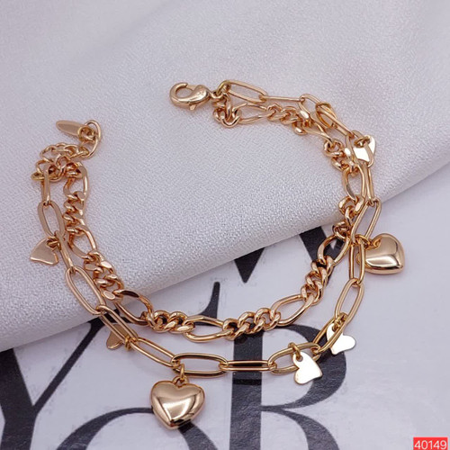 1. دستبند ژوپینگ اصل زنانه مدل دولایه قلب با آبکاری طلای لوکس کد 40149 2. خرید دستبند مارک ژوپینگ رنگ ثابت طرح دو قلب مدل 40149 از بدلیجات رستا 3. دستبند ظریف دخترانه ژوپینگ مدل قلب دولایه ضد حساسیت با درخشش خیرهکننده